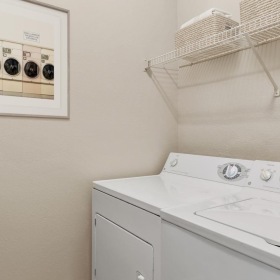 We've got your laundry sorted well lit laundry room with side-by-side units