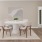 a dining room with a table and chairs
