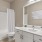 a bathroom with a tub sink and toilet