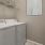 side-by-side washer/dryer units in laundry room