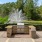 outdoor grill in front of pond